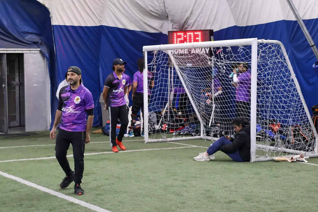 A doubles game underway at an indoor sports facility